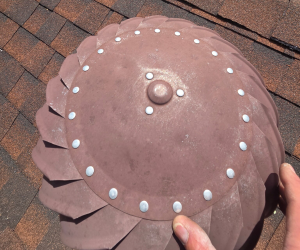 Claiming hail damage on a roof includes soft metals — hail dents across a metal turbine roof vent