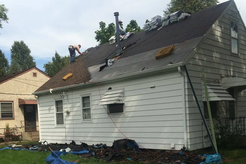 Right Away Construction crews working on a roof replacement in Blaine, Minnesota.