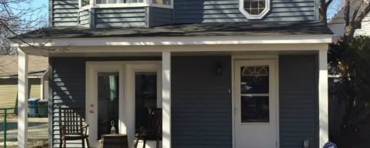 New blue-gray vinyl siding and front porch, Lakeville MN