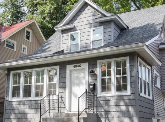 The same Northeast Minneapolis home after roof and siding renovation