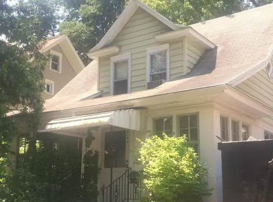 A Northeast Minneapolis home before its roof and siding renovation