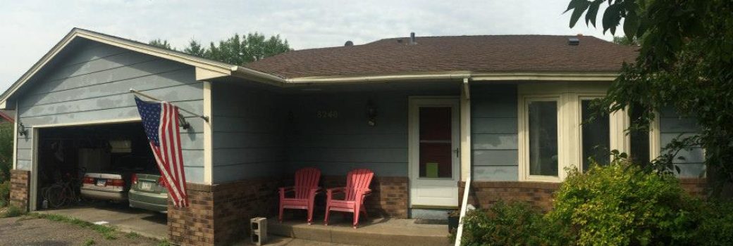 Blue Edina, MN rambler with a new brown architectural shingle roof installed by Right Away Construction