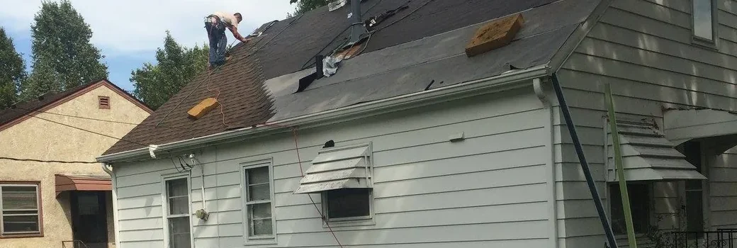 Right Away Construction crews working on a roof replacement in Blaine, Minnesota.