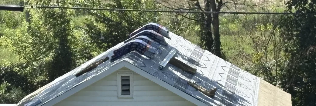 New underlayment over the ridge and gable end of a Minneapolis roof