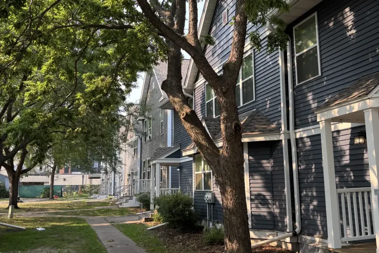 Window replacement after view of apartment entry porches in Minneapolis, MN.